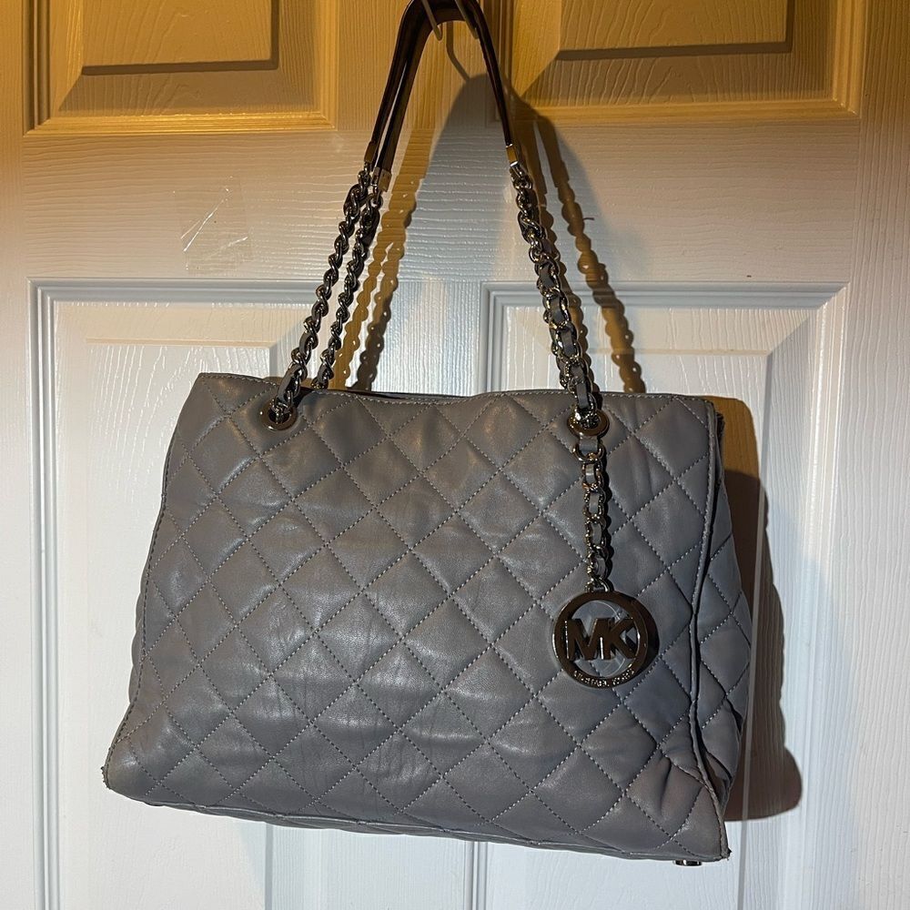 Michael Kors soft leather gray quilted shoulder bag silver tone chain straps.